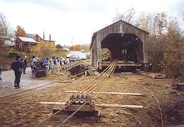 Brown's River Bridge being removed from the river