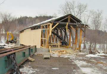 The siding is nearly complete on the downstream side. Photo by Joe Nelson, February 20,
2004