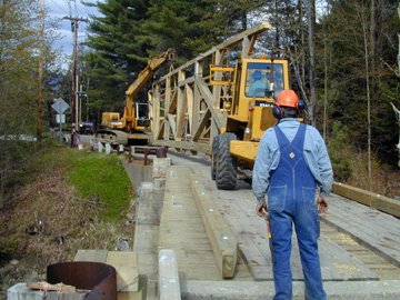 Trusses moved over the river. Photo by Joe Nelson, May 9,
2002