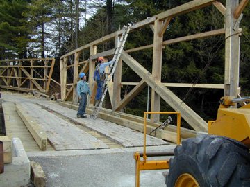 Trusses moved over
the river. Photo by Joe Nelson, May 9, 2002