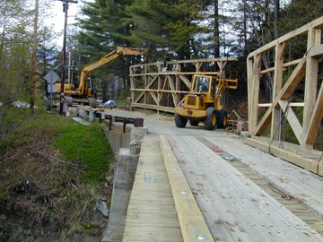 Trusses moved over the river. Photo by Joe Nelson, May 9,
2002