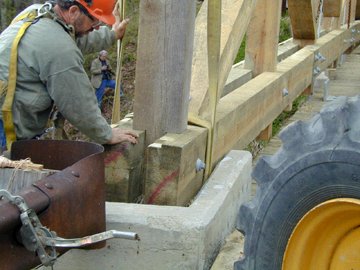 Trusses moved over
the river. Photo by Joe Nelson, May 9, 2002