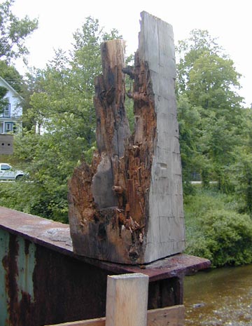 Rotted beam-end. Photo by Joe Nelson,July 5, 2000.